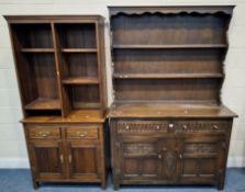 A 20TH CENTURY OAK DRESSER, the three-tier plate rack atop a base with two drawers, over double