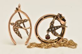 AN EDWARDIAN PENDANT WITH CHAIN AND A BROOCH, the pendant of an open work circular form with a