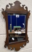 AN EARLY 20TH CENTURY FRETWORK WALL MIRROR Dimensions:width 31cm x height 53cm Condition Report: