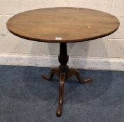 A GEORGIAN OAK TILT TOP TRIPOD TABLE Dimensions:diameter 81cm x height 71cm Condition Report: