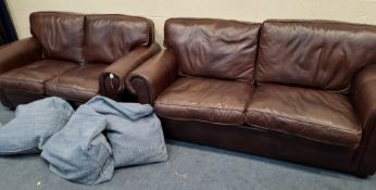 A BROWN LEATHER LARGE TWO SEATER SOFA, along with a smaller two seater sofa, along with a quantity
