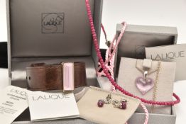 FOUR ITEMS OF JEWELLERY, to include a boxed 'Lalique' pink heart pendant, bail signed 'Lalique',