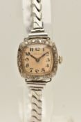 AN EARLY 20TH CENTURY, LADIES 18CT GOLD AND DIAMOND SET 'ROLEX' WRISTWATCH, manual wind, discoloured