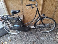 A VAN HOLLAND LADIES BIKE with a 21in frame, rear rack, stand, rear wheel lock with two keys