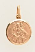 A YELLOW METAL SMALL ST. CHRISTOPHER PENDANT, fitted with an oval bail, stamped 375, Itialian