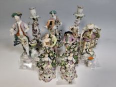 A COLLECTION OF NINE 18TH CENTURY DERBY PORCELAIN BOCAGE FIGURES AND FIGURAL CANDLESTICKS, CIRCA