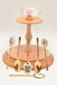 A SET OF SIX SILVER TEASPOONS, gilt teaspoons with floral enamel detail, hallmarked 'The