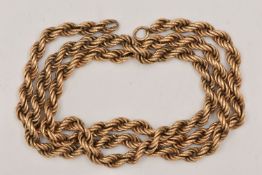 A YELLOW METAL ROPE TWIST CHAIN, missing clasp, unmarked, approximate length 420mm, approximate