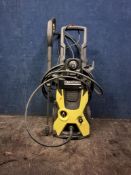 A KARCHER K5 PRESSURE WASHER with lance and one spare nozzle but no detergent bottle (PAT pass and