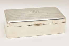 A SILVER CIGARETTE CASE, of a rectangular form, engine turned pattern with engraved cartouche,