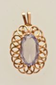 A YELLOW METAL SYNTHETIC SAPPHIRE PENDANT, set with an oval cut synthetic sapphire nine claw setting