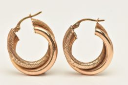 A PAIR OF 9CT GOLD HOOP EARRINGS, designed as a polished and textured intertwined hoops, hinged