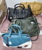 A GROUP OF FOUR VINTAGE RADLEY HANDBAGS, to include 'Explorer' grab bag featuring a scotty dog