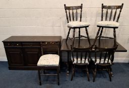 A 20TH CENTURY RECTANGULAR DINING TABLE, raised on trestle-style legs, united by a stretcher, a