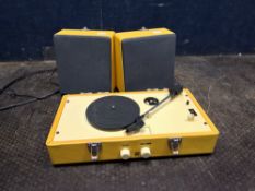 A STEEPLETONE SRP030S SUITCASE RECORD PLAYER with clip-on speakers (PAT pass and working)