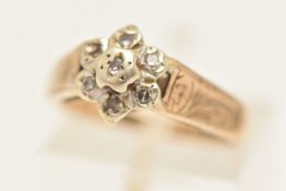 A 9CT GOLD DIAMOND CLUSTER RING, set with single cut diamonds, mounted in a very worn white metal