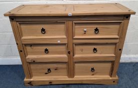 A MODERN CORONA PINE BANK OF SIX DRAWERS Dimensions:width 132cm x depth 49cm x height 105cm