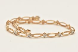 A 9CT GOLD DIAMOND SET LINE BRACELET, designed as a series of single cut diamond set links,