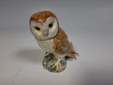 A VINTAGE BESWICK CERAMIC BARN OWL FIGURINE (MODEL 2026), designed by Albert Hallam, realistically