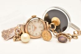 AN ASSORTEMENT OF JEWELLERY AND A SMALL CAPSULATED COIN, to include a small 9ct gold St. Christopher