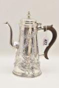 A MID-18TH CENTURY WHITE METAL COFFEE POT, scrolling foliate pattern with vacant cartouche, fitted