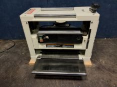 AN AXMINSTER CT-356 THICKNESSER with dust extractor attachment, cut width 12 in, max cut height 6 in