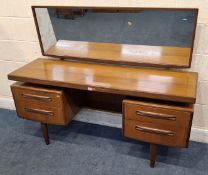 A G PLAN FRESCO MID CENTURY TEAK DRESSING TABLE, with a rectangular mirror, five assorted drawers,