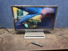 A PANASONIC TX-L37ET5B 37in TV with remote and a Panasonic DVD player (both PAT pass and working)