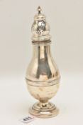 AN EARLY 20TH CENTURY SILVER SUGAR CASTER, polished form, pierced cover with pointed finial,