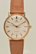 A GENTS 9CT GOLD 'OMEGA' WRISTWATCH, manual wind, round silvered dial signed 'Omega Geneve', baton
