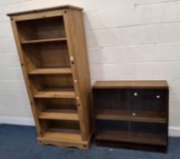 A MODERN CORONA PINE OPEN SHELVING UNIT, along with a bookcase with double glass sliding doors