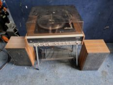 A 1950s WIRE FRAME RECORD PLAYER STAND with slots below for records, a Ferguson Unit Audio music