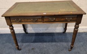 JAMES SHOOLBRED & CO, AN EDWARDIAN WALNUT WRITING DESK, with a green leather surface, two frieze