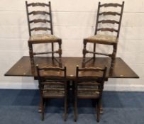 AN EARLY 20TH CENTURY OAK DRAW LEAF DINING TABLE, raised on trestle-style legs, united by a