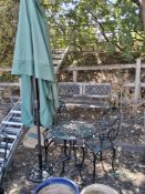 A MODERN CAST ALUMINIUM CIRCULAR GARDEN TABLE, two matching chairs, a wind-up parasol base and a