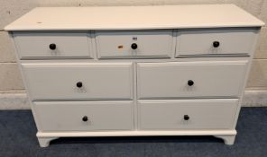 A MODERN CREAM SIDEBOARD / BANK OF SEVEN DRAWERS Dimensions:width 122cm x depth 42cm x height 88cm