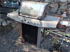 A JOHN LEWIS TRIPLE BURNER GAS BARBEQUE, with side shelves Condition Report:in need of cleaning,