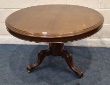 A 19TH CENTURY MAHOGANY TILT TOP CENTRE TABLE, with a circular top, raised on a bulbous pedestal