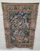 A SMALL WALL HANGING TAPESTRY, depicting various animals, people, flowers and other foliate