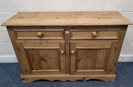 A MODERN PINE SIDEBOARD, fitted with two drawers over double cupboard doors Dimensions:width 128cm x