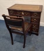 A SMALL REPRODUCTION MAHOGANY TWIN PEDESTAL DESK, with a tanned leather writing surface, fitted with