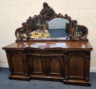 A LARGE 19TH-CENTURY MAHOGANY SIDEBOARD, the mirror back with fruit, scrolled and foliate details,