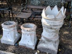 A PAINTED VICTORIAN SPIKED CHIMNEY POT, height 77cm, along with two other painted chimney pots