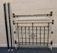 A WHITE PAINTED TUBULAR METAL AND BRASS 4FT BEDSTEAD, with siderails Condition Report:The rail to