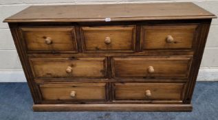 A MODERN PINE SIDEBOARD / BANK OF SEVEN ASSORTED DRAWERS Dimensions:width 140cm x depth 45cm x