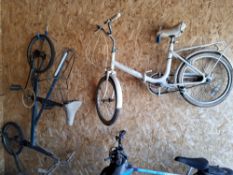 A MOULTON F FRAME BLUE BICYCLE, with a Brooks saddle, along with a Raleigh white folding bicycle