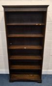 AN OAK OPEN BOOKCASE, with five shelves Dimensions:width 87cm x depth 31cm x height 183 Condition