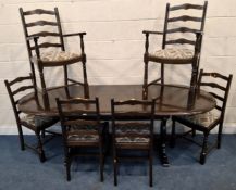 A 20TH CENTURY OAK OVAL EXTENDING DINING TABLE, with a single fold-out leaf, raised on trestle-style