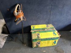 A GREENLINE ELECTRIC GARDEN SHREDDER in original box (untested) and a Titan hedge trimmer (PAT