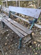 A CAST IRON FAUX BOIS SLATTED GARDEN BENCH, length 137cm, and a cast aluminium slatted garden